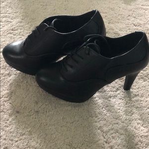 Black lace heeled booties. Never worn